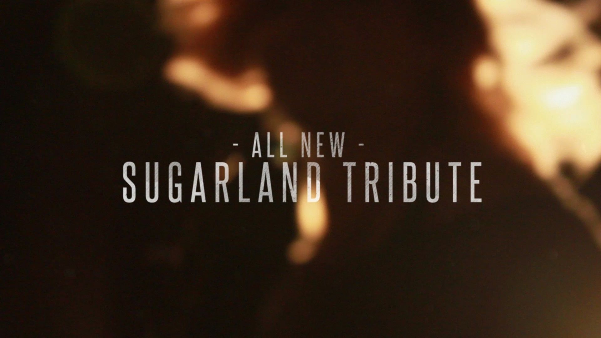 Out of focus picture with "All New Sugarland Tribute"